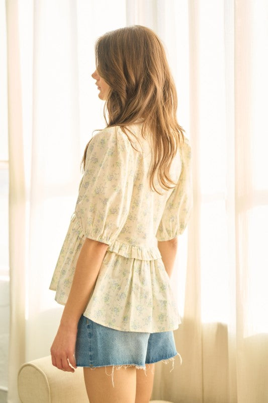 Floral pleated front tie ruffled top