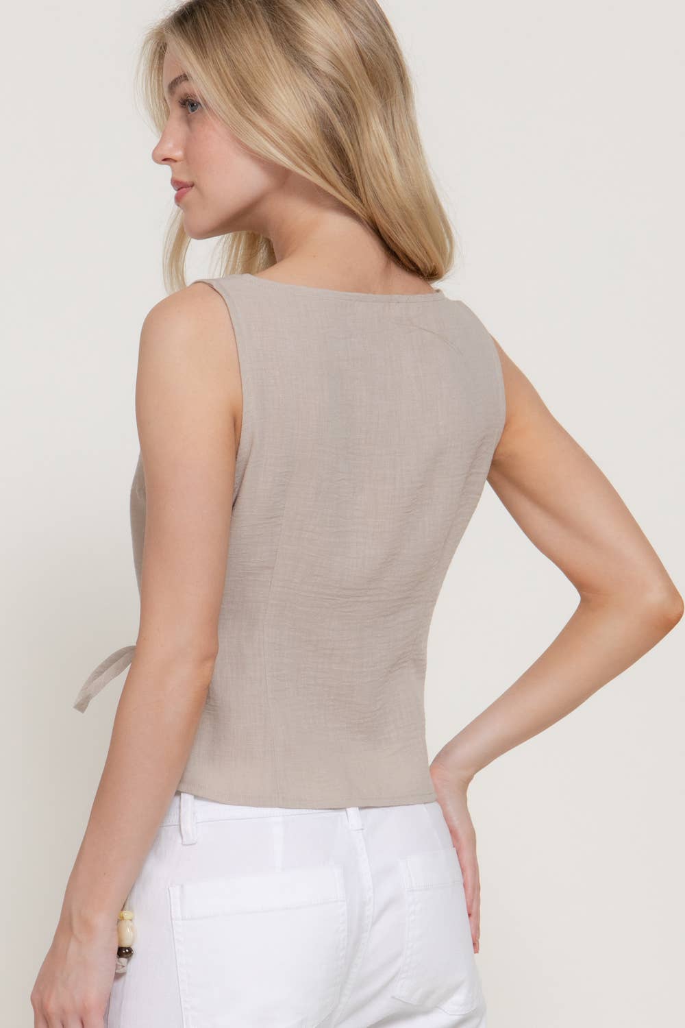 Sleeveless Boat Neck Top with Asymmetrical Hemline