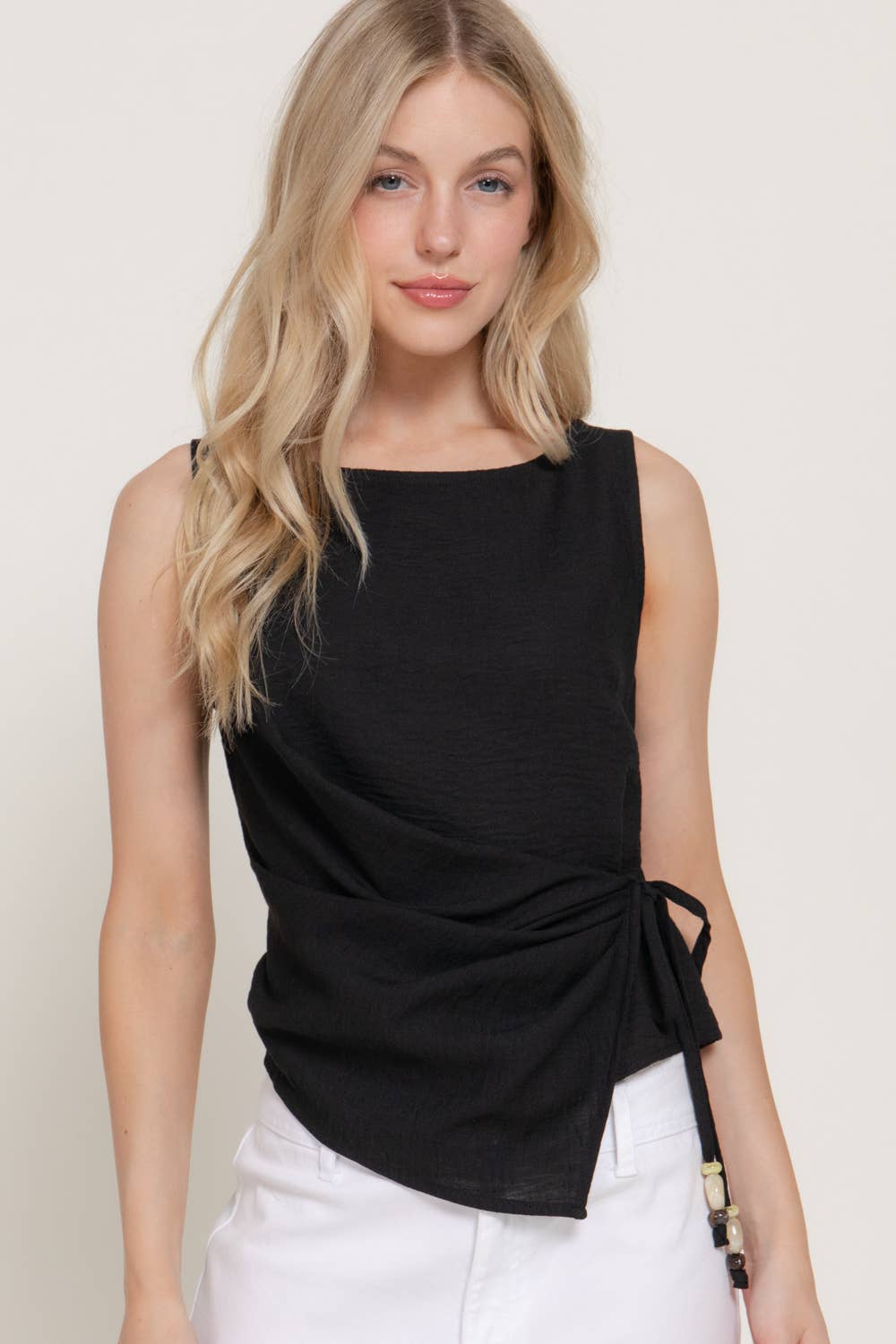 Sleeveless Boat Neck Top with Asymmetrical Hemline
