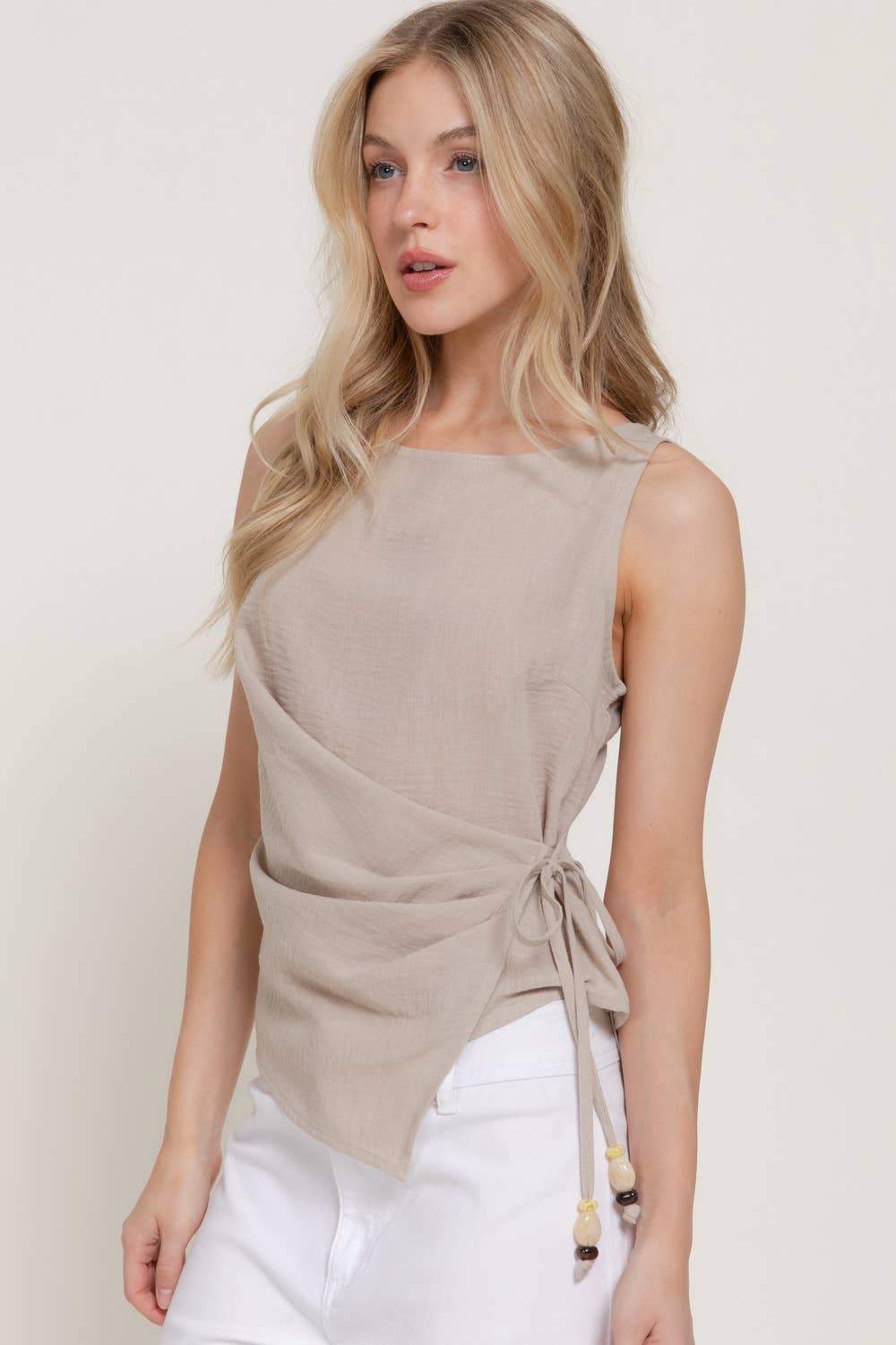 Sleeveless Boat Neck Top with Asymmetrical Hemline