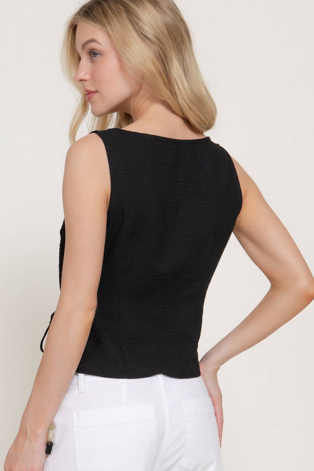 Sleeveless Boat Neck Top with Asymmetrical Hemline
